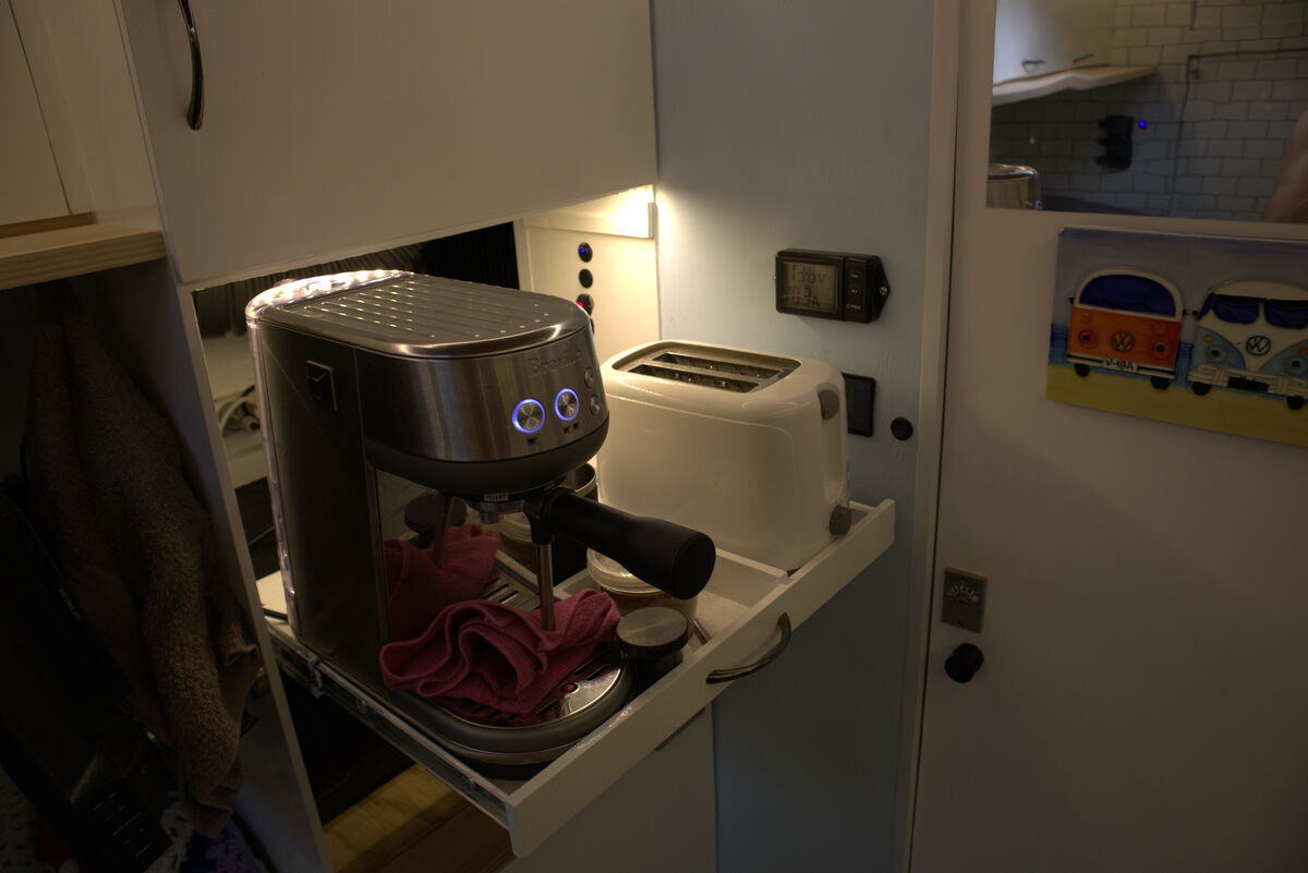 Coffee machine on slide-out drawer